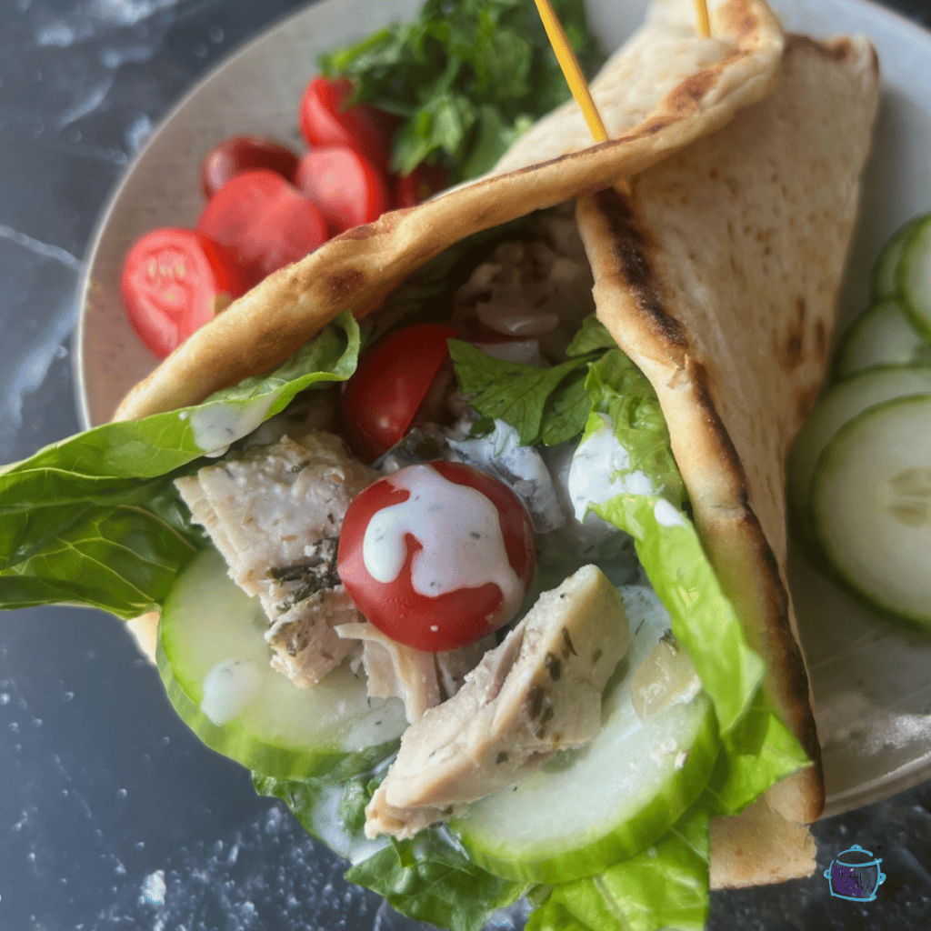 slow cooker chicken gyro on a plate