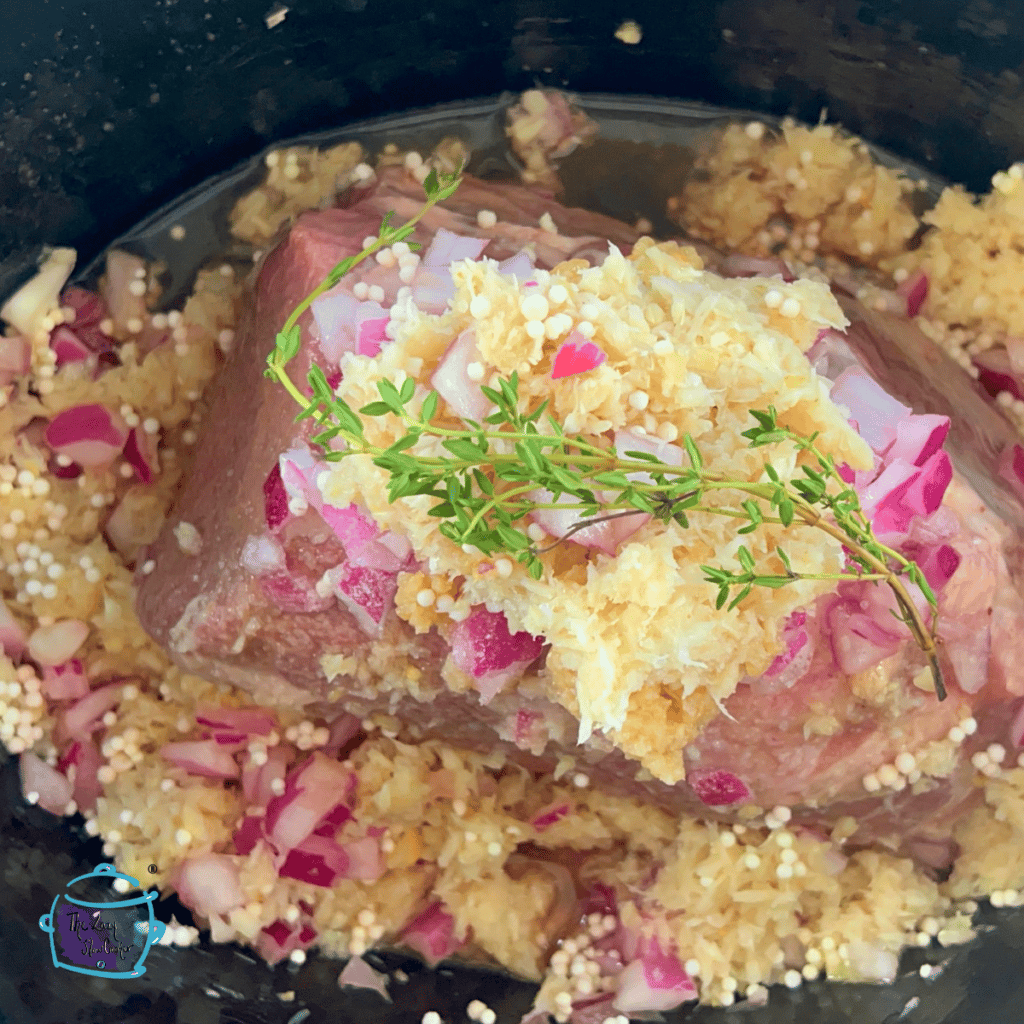 horseradish eye of round roast in slow cooker before cooking