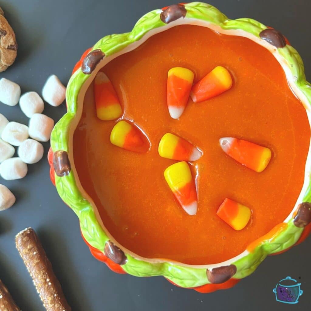 looking down on a bowl full of halloween dessert dip made with candy corn