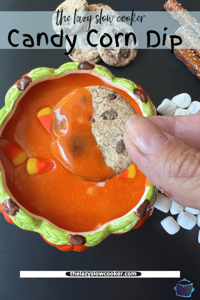 a chocolate chip cooked covered with candy corn dip halloween dessert dip
