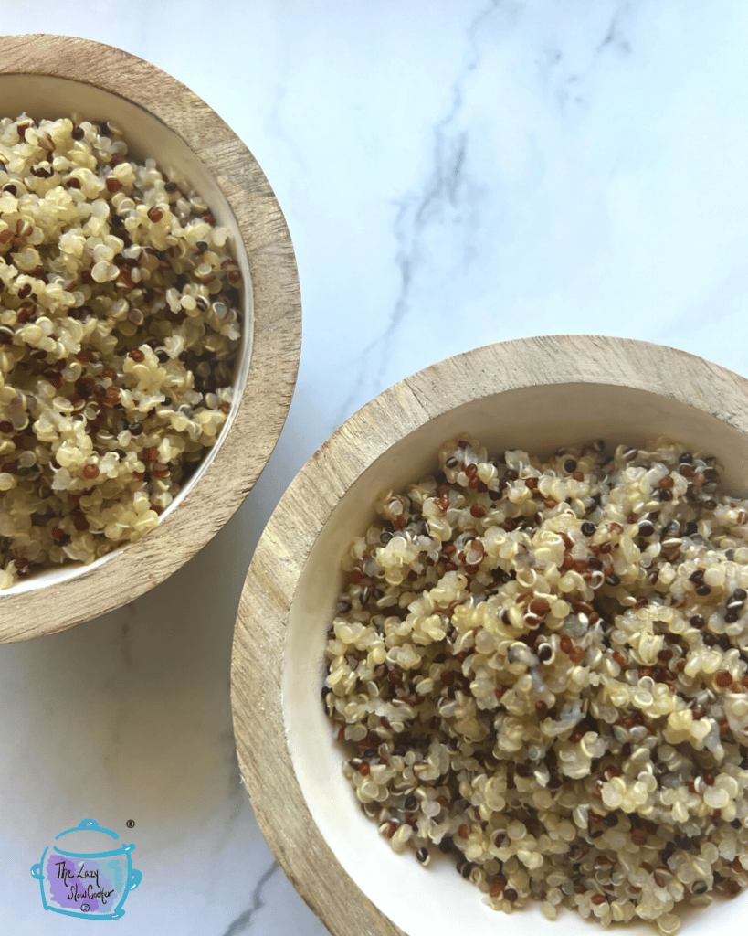 two wooden bowls full of crockpot quinoa