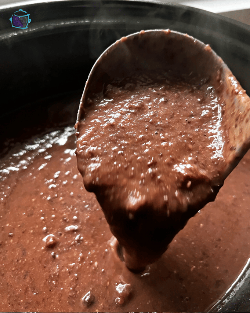 slow cooker black bean ingredients soup in slow cooker after blending