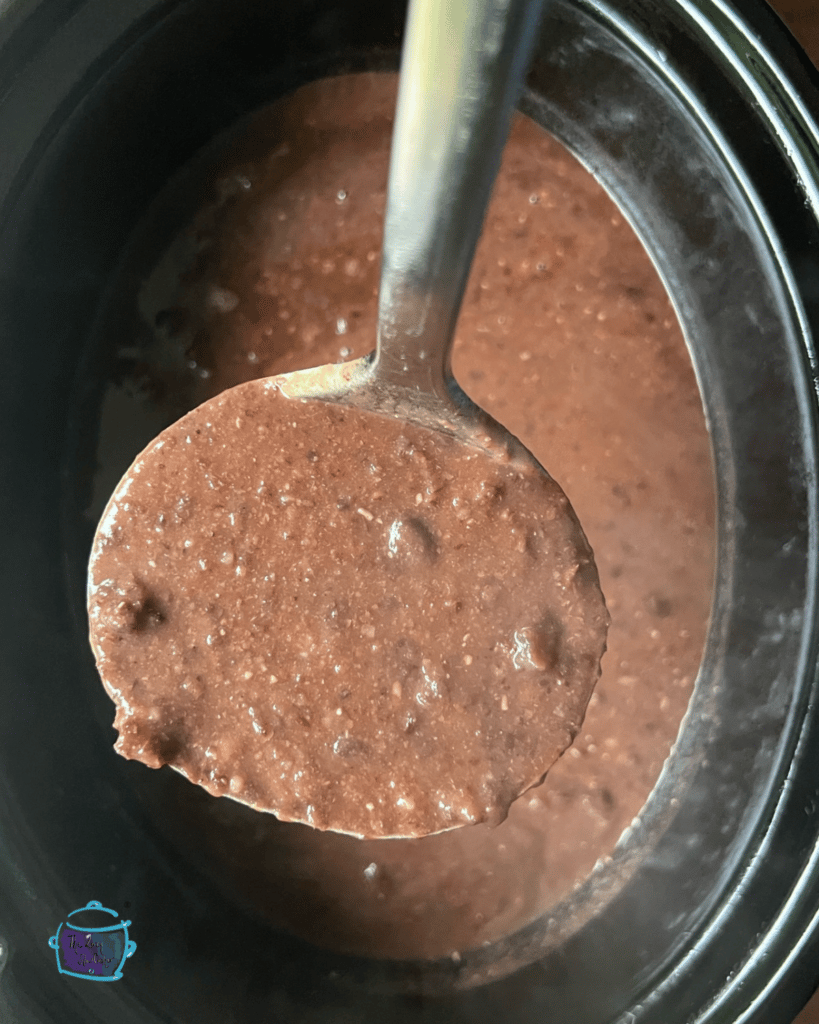 slow cooker black bean ingredients soup in slow cooker after blending