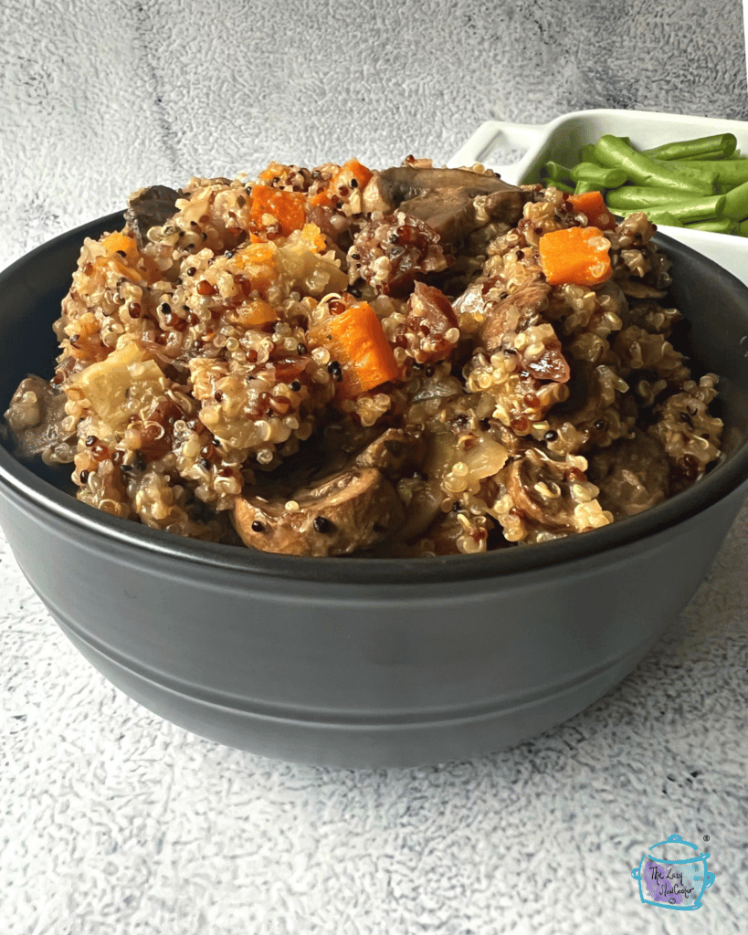 a bowl full of finished quinoa stuffing after slow cooking