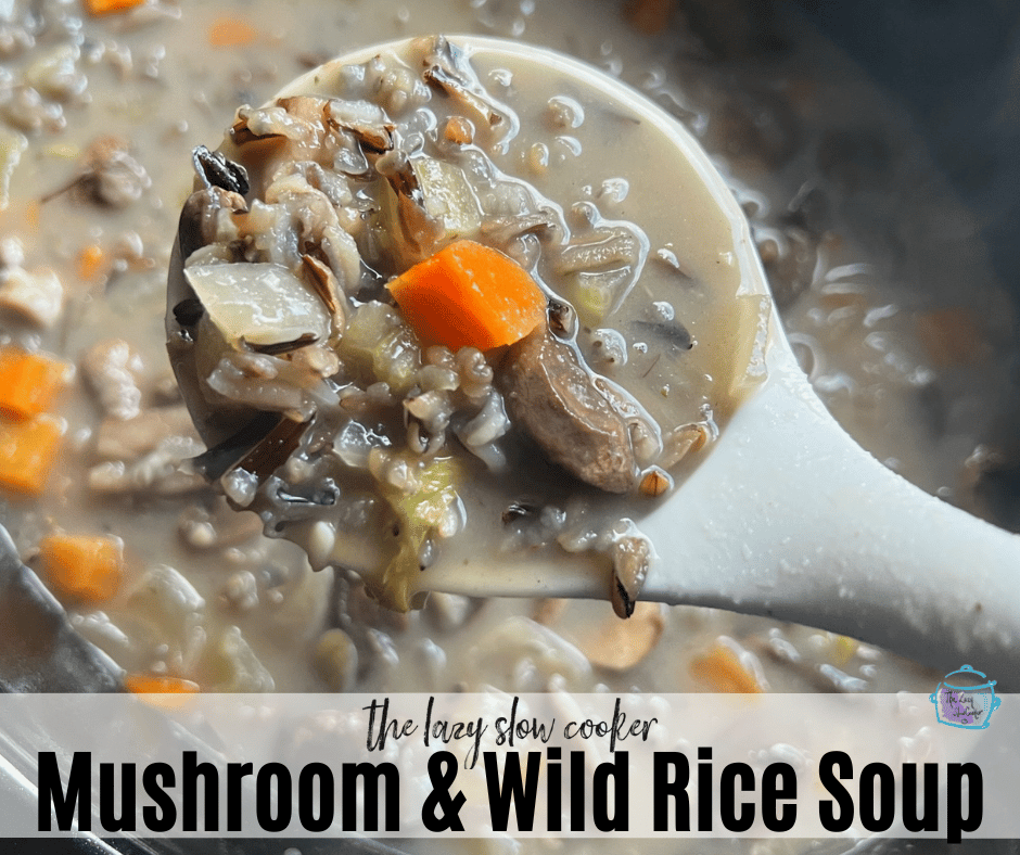 slow cooker mushroom and wild rice soup on a spoon over crockpot