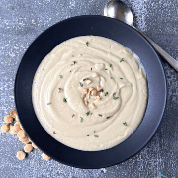 looking down on a bowl of slow cooker creamy cauliflower soup