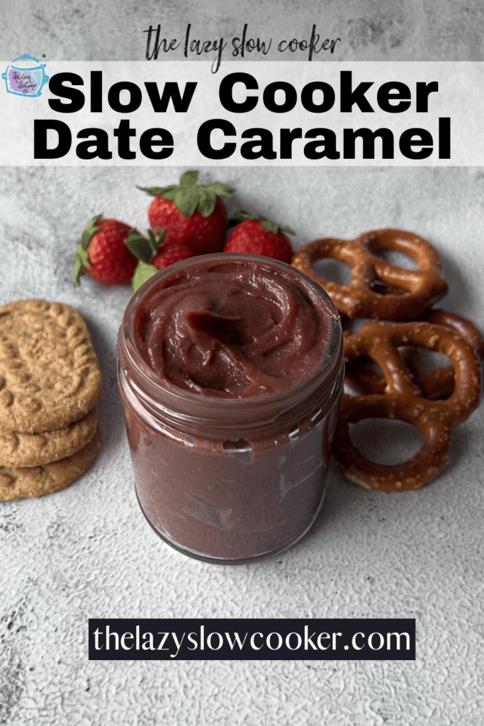 a jar of crockpot date caramel surrounded by pretzels, strawberries and wafers
