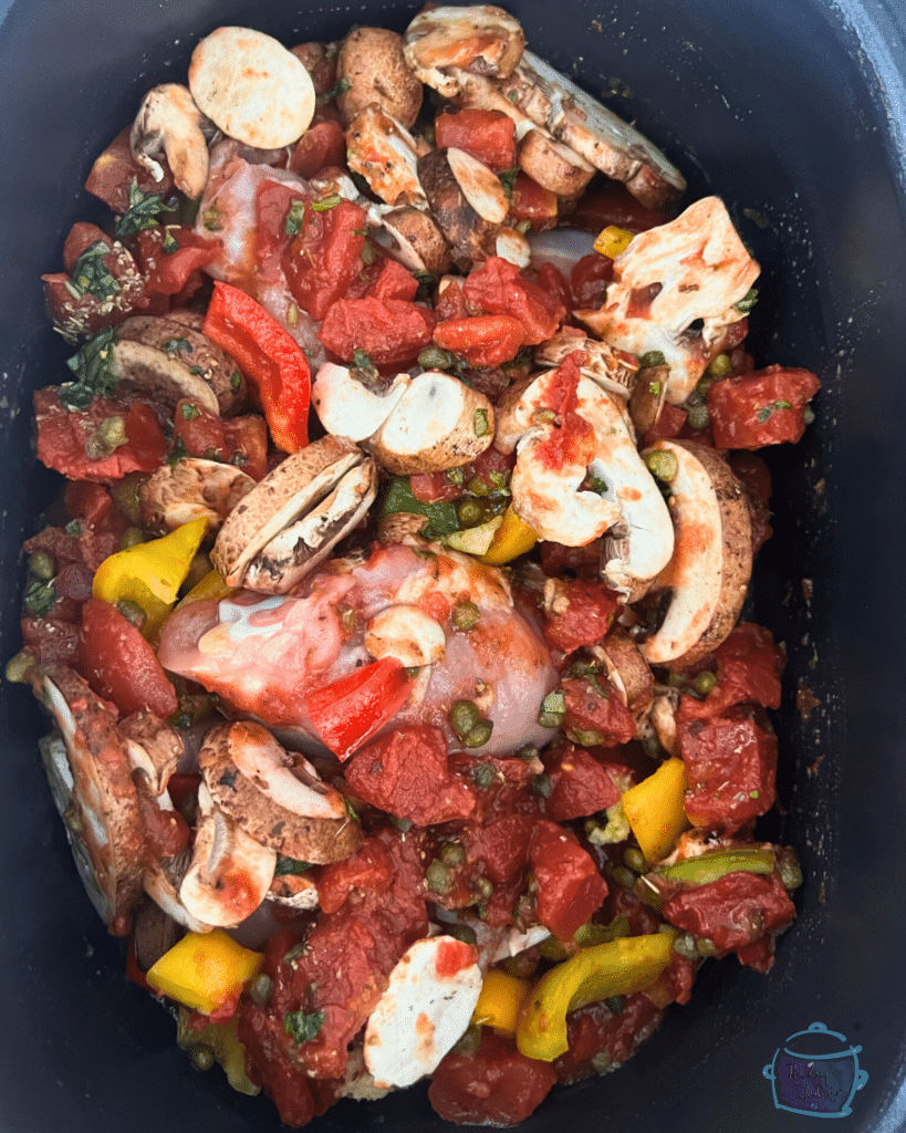 chicken cacciatore ingredients in slow cooker before cooking