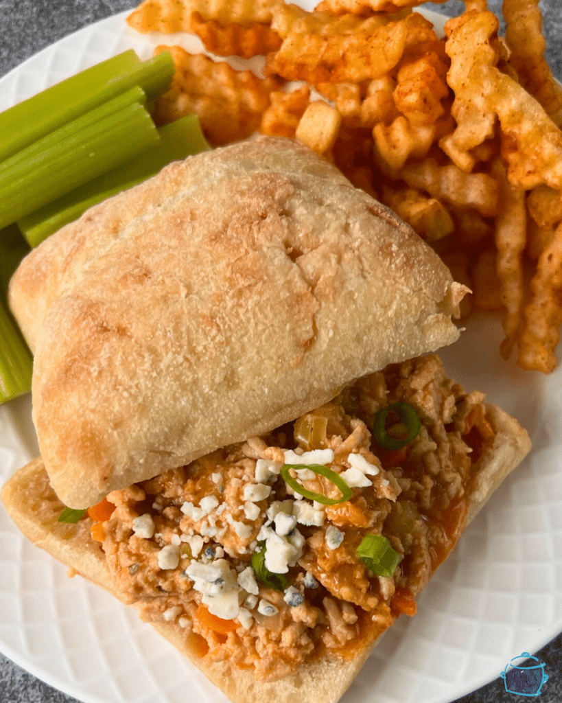 slow cooker buffalo sloppy Joe on a sour dough roll.