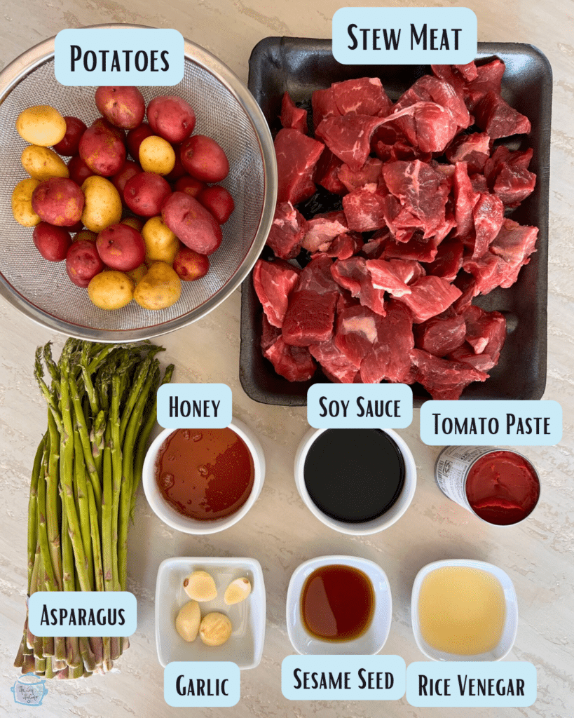 slow cooker Asian steak bites, asparagus and potatoes ingredients with labels