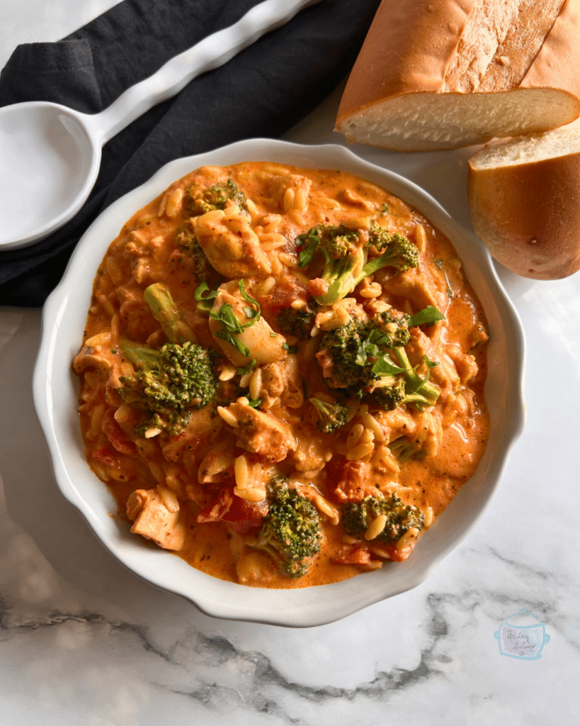 Slow cooker chicken orzo and rice in blush sauce