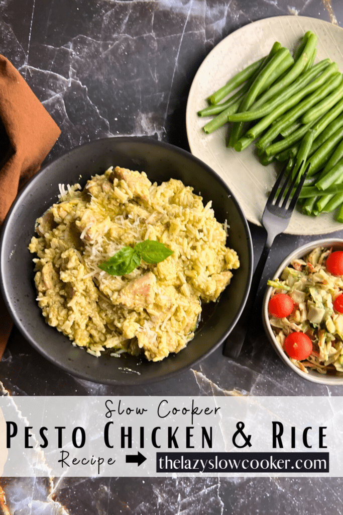 Pesto chicken and rice in a black bowl topped with basil