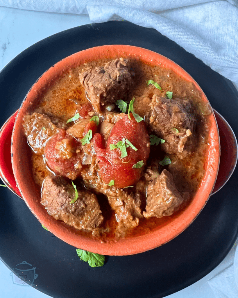 Slow cooker carne guisada in a bowl