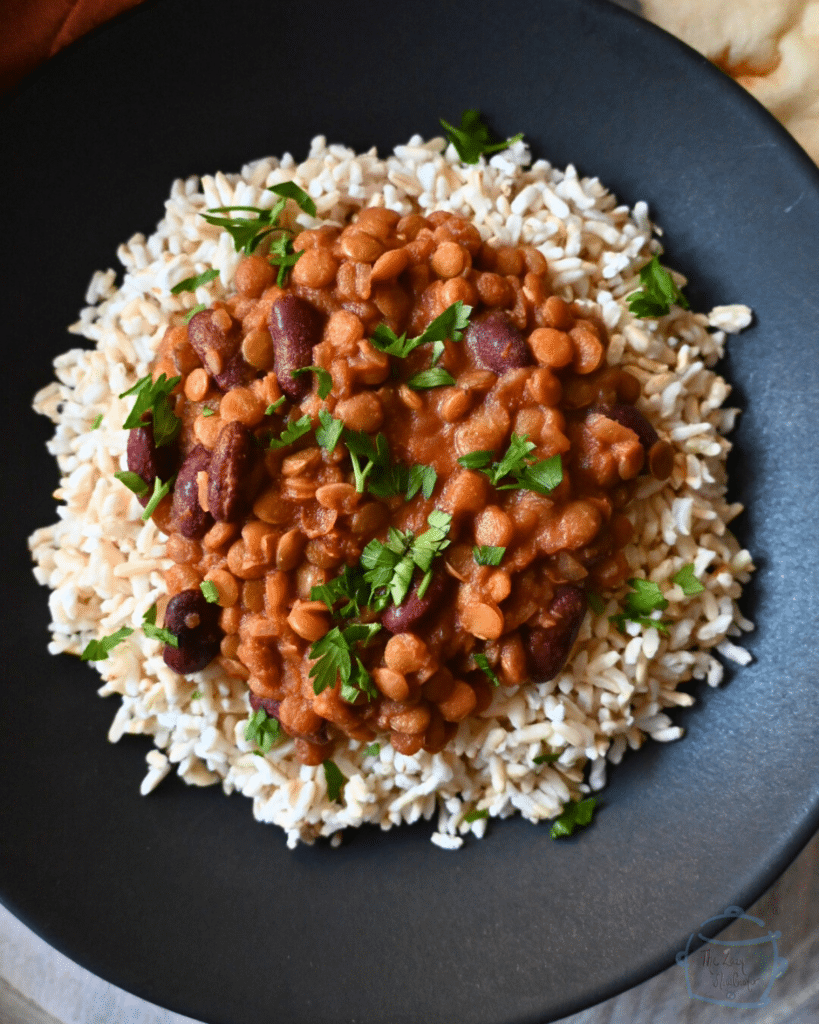 slow cooker madras lentils on a bed of white rice