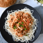 slow cooker tomato basil chicken on a bed of hearts of palm spaghetti