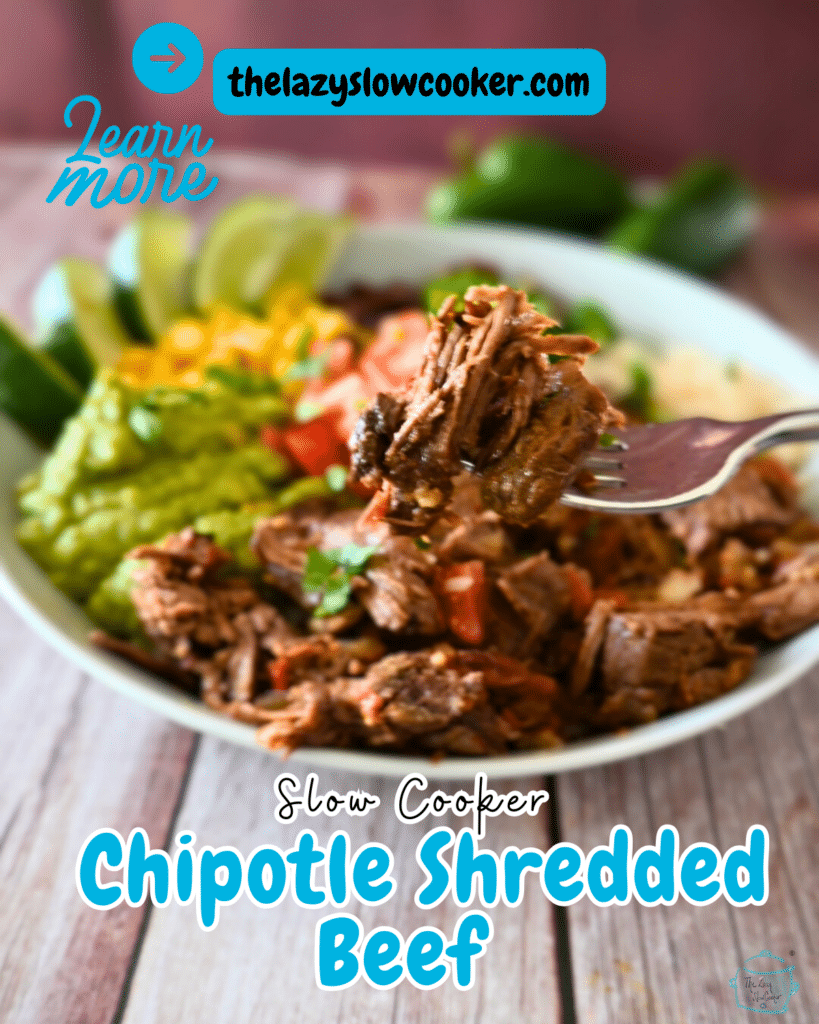 A forkful of shredded chipotle beef held over a plate of chipotle beef with corn beans tomatoes and lime wedges