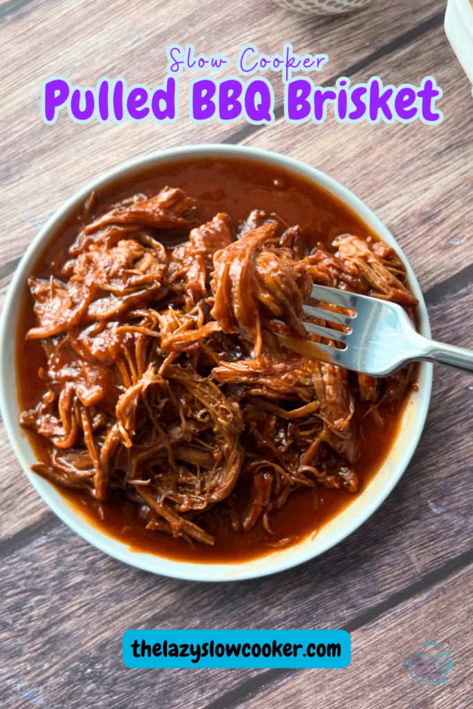 shredded brisket on a white round plate