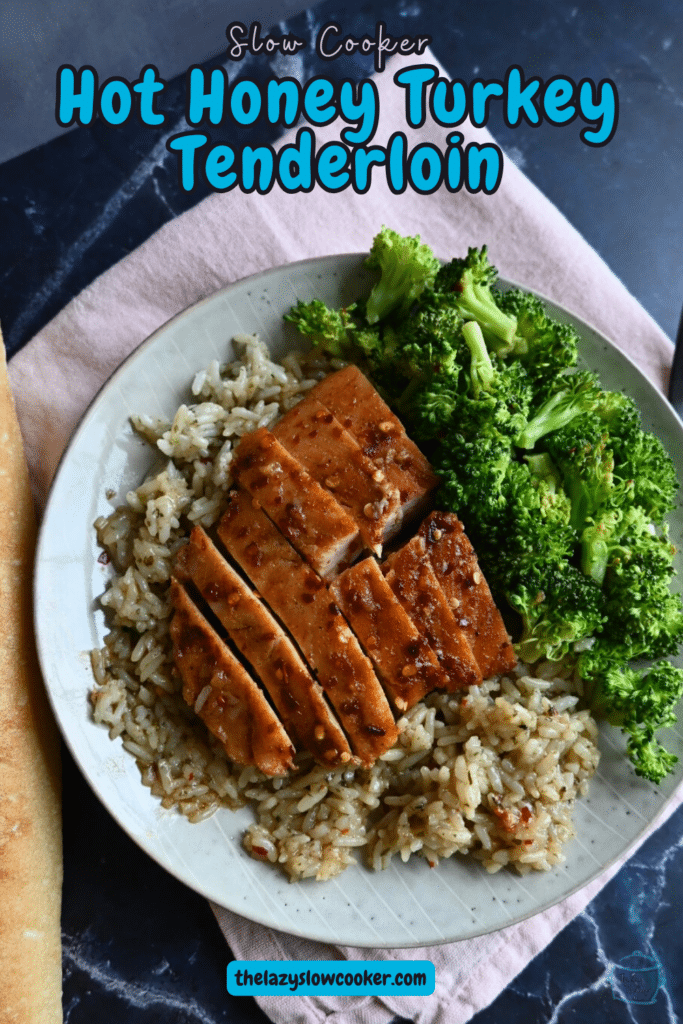 Hot honey glazed slow cooker turkey tenderloin sliced on a bed of rice with broccoli
