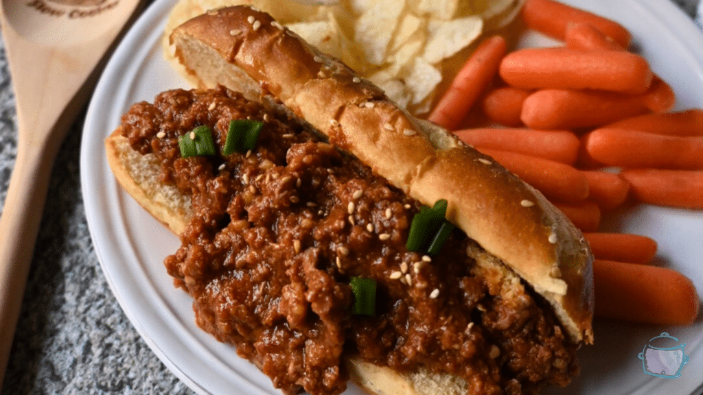 slow cooker honey garlic sloppy Joe on a pretzel bun