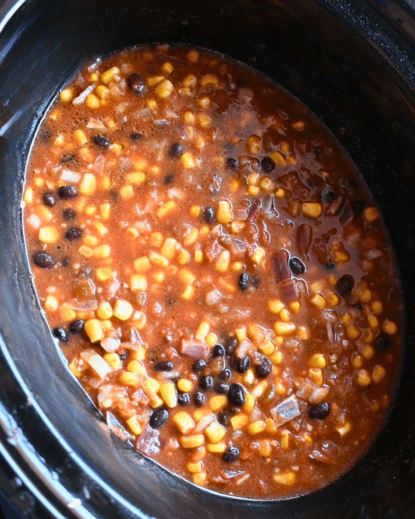 All ingredients in slow cooker ready to get started