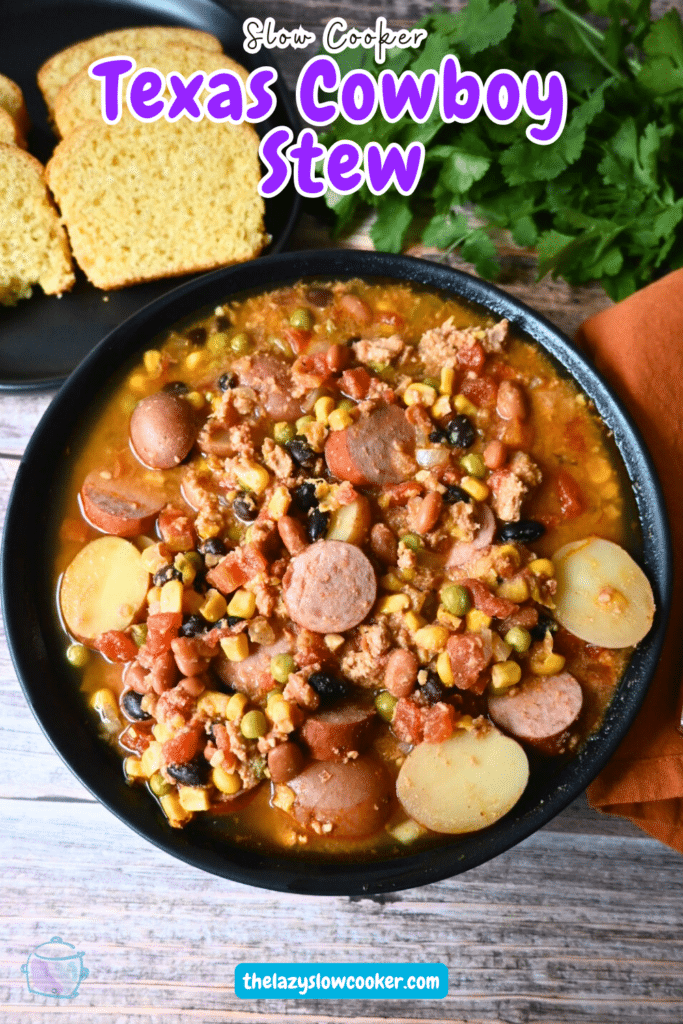 Texas cowboy stew in a black bowl with cornbread on the side