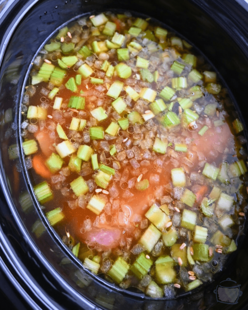 miso turkey farro soup in slow cooker before cooking