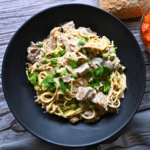 crockpot leftover turkey tetrazzini in a black bowl