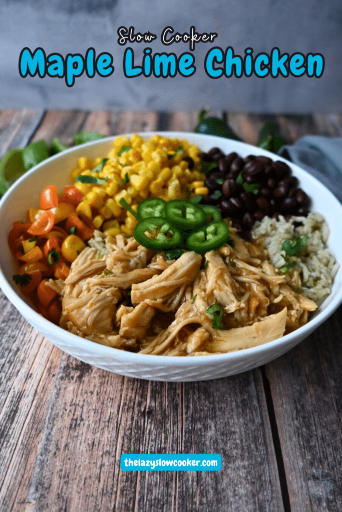 a bowl with maple lime chicken, rice, beans, corn and tomatoes