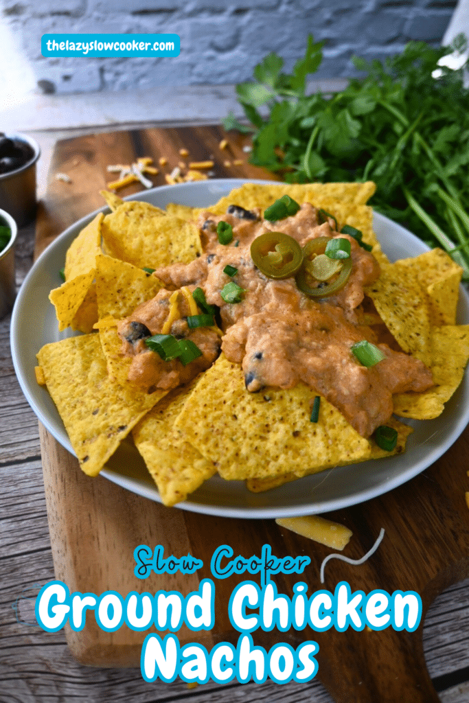 nacho chips topped with slow cooker ground chicken cheesy nacho sauce