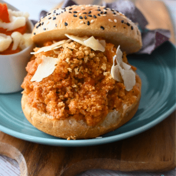 seeded bun filled with slow cooker ground chicken sloppy joes