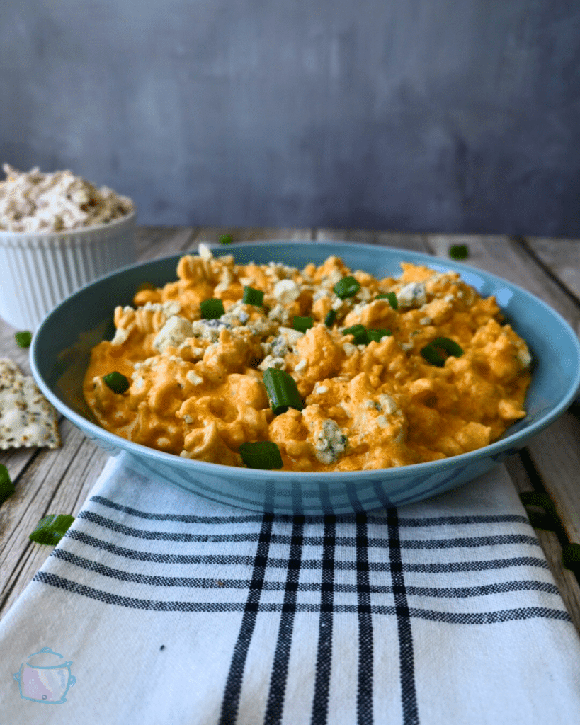 Slow cooker cauliflower buffalo macaroni and cheese in a bowl