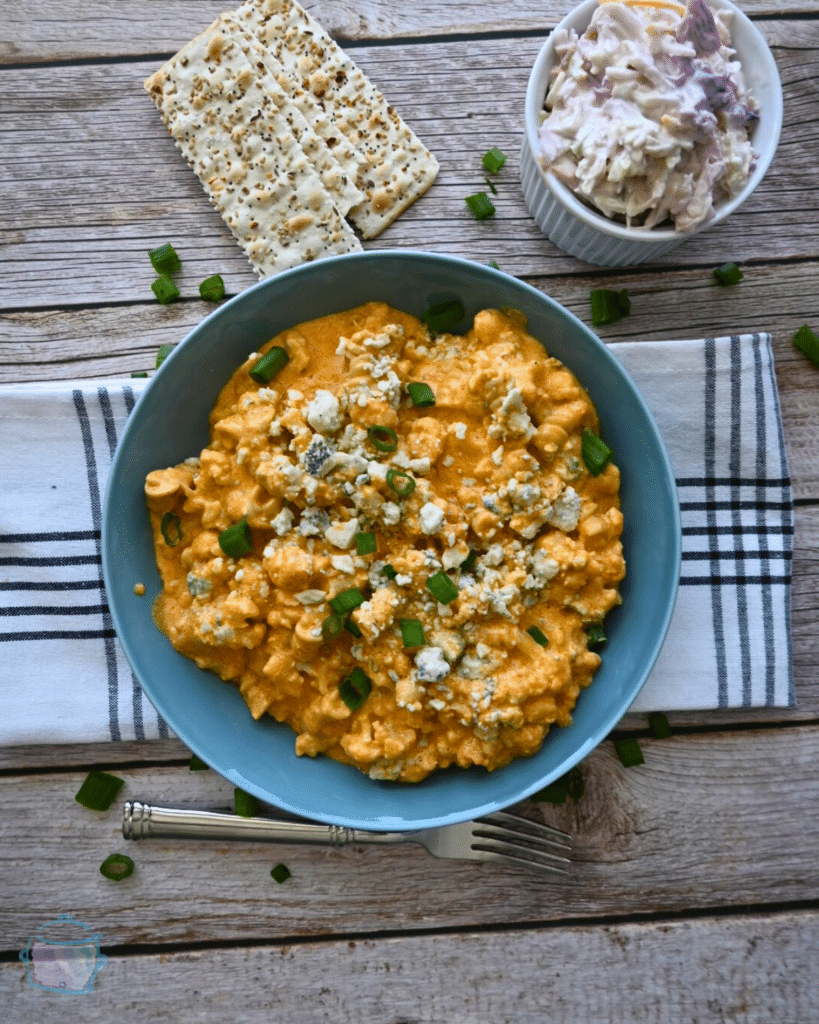 Slow cooker cauliflower buffalo macaroni and cheese in a bowl