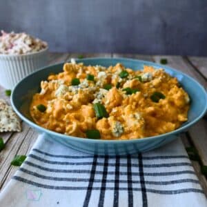 Slow cooker cauliflower buffalo macaroni and cheese in a bowl