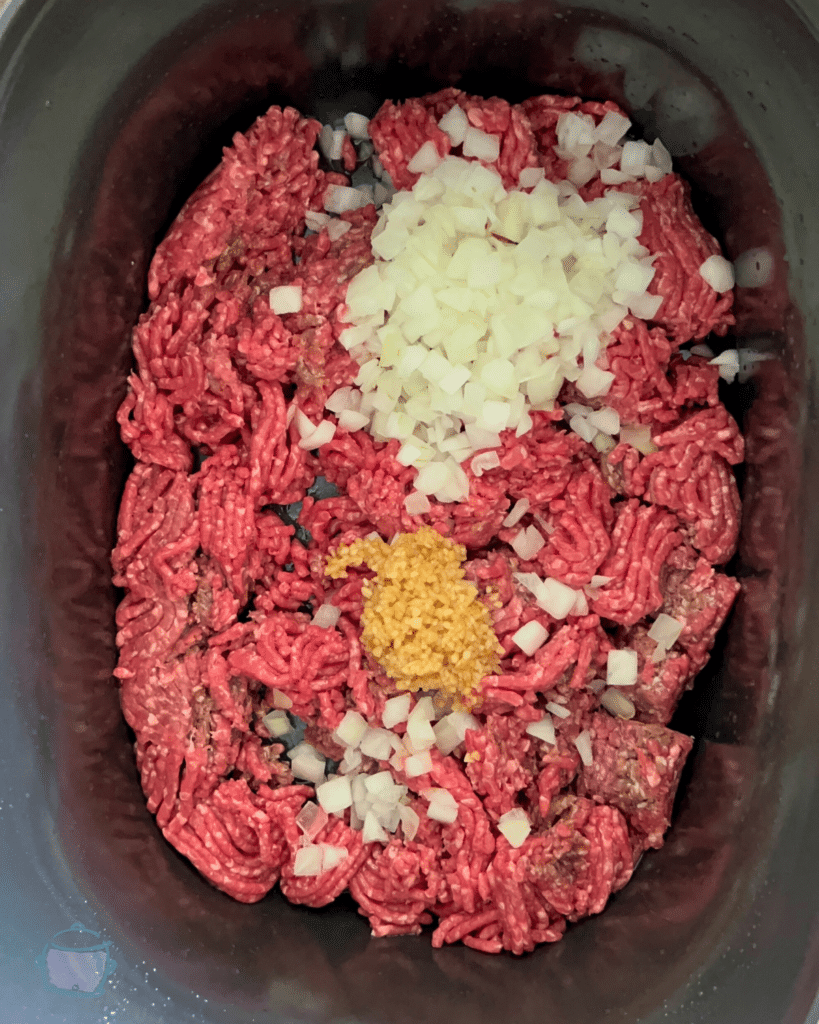 sloppy joe ingredients in slow cooker before mixing