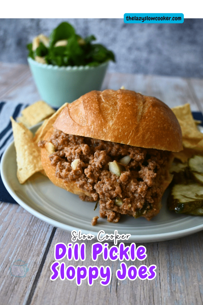 close up of a slow cooker dill pickle sloppy Joe sandwich with chips