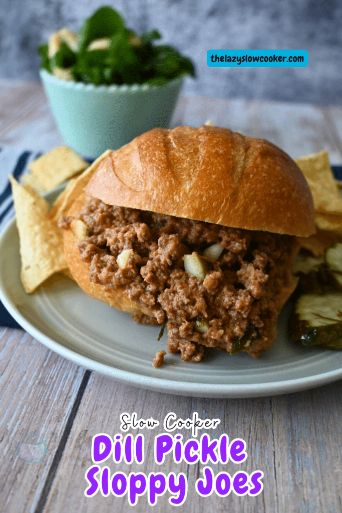 close up of a slow cooker dill pickle sloppy Joe sandwich with chips