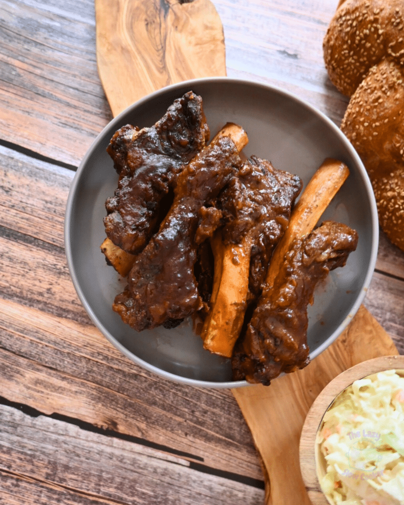 slow cooked beef back ribs in a grey bowl