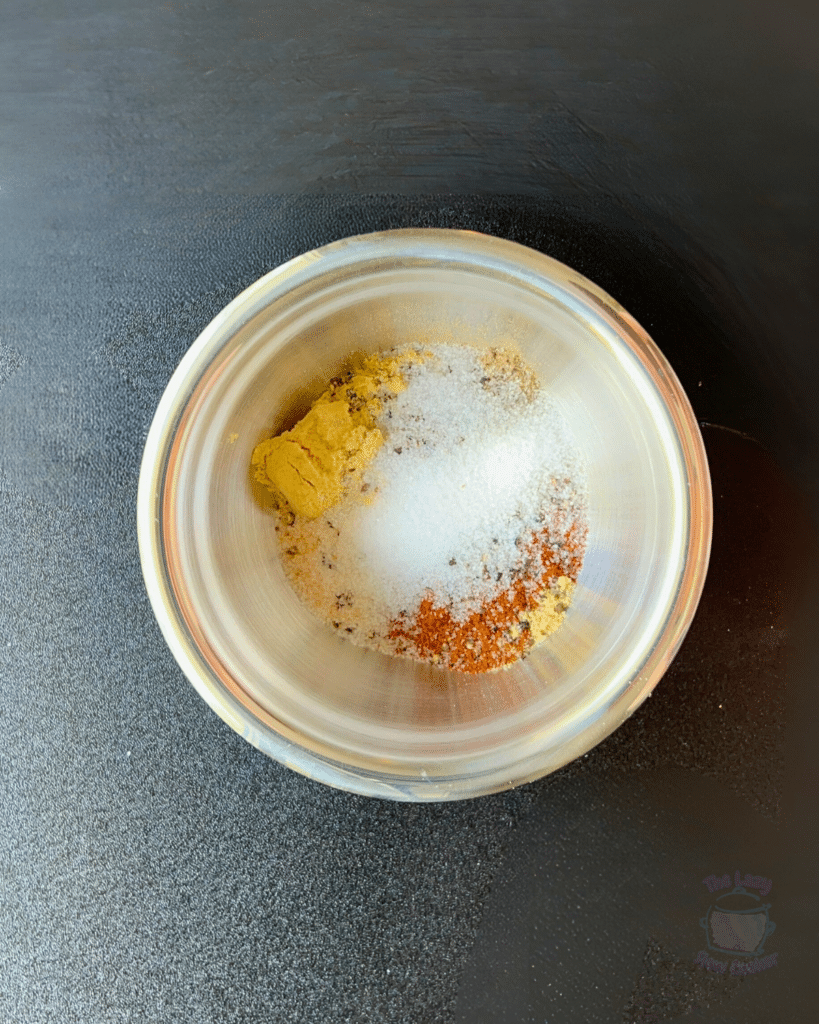 rub ingredients in a small silver bowl