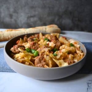 Meatballs and cabbage in a gray bowl
