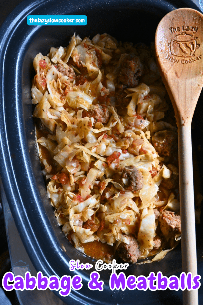 Meatballs and cabbage in a slow cooker with a wooden spoon ready to serve