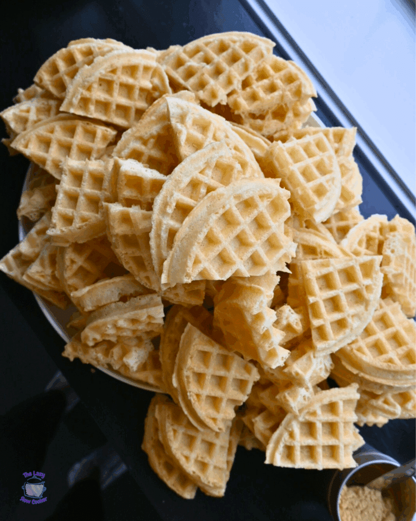 quartered waffles on a butting board