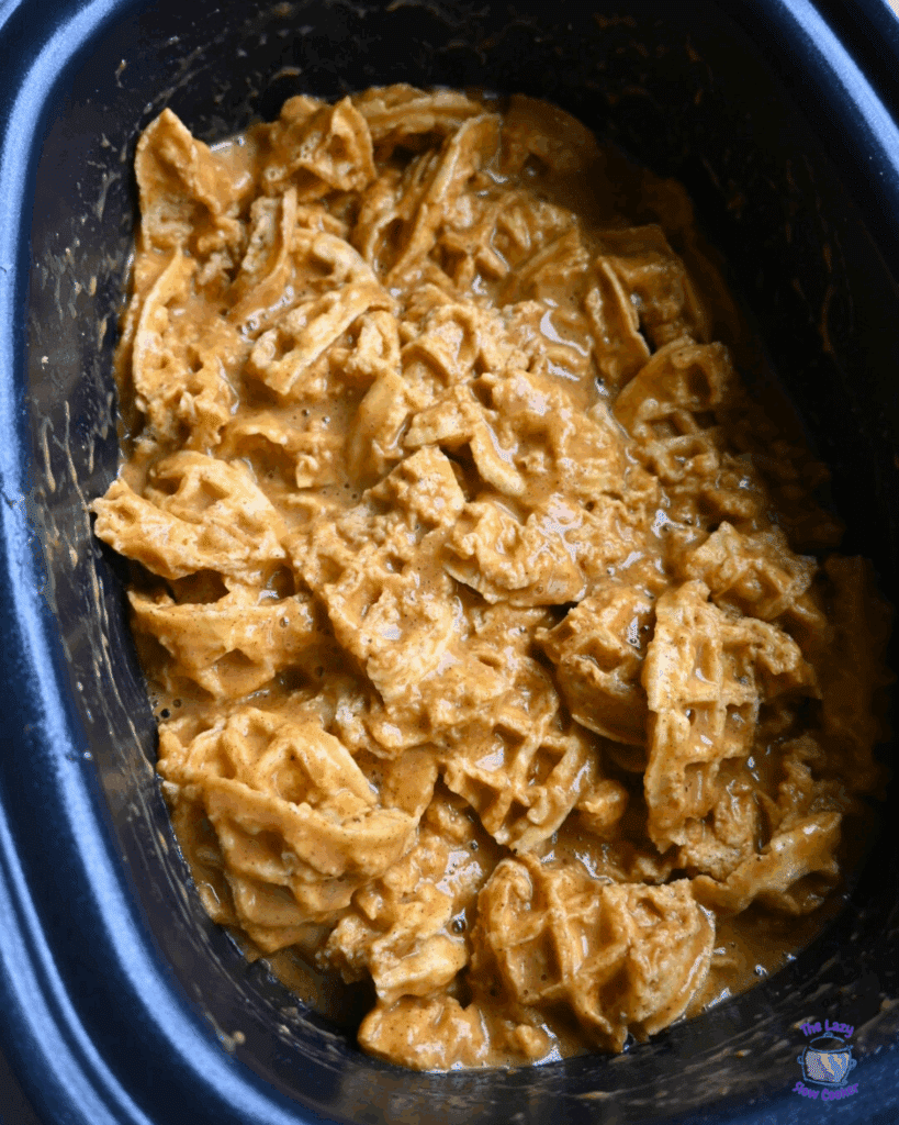 all pumpkin and waffle ingredients in slow cooker before cookig