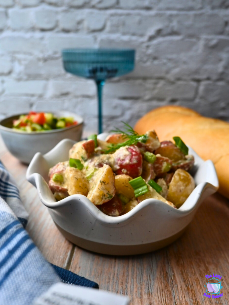 a bowl full of slow cooker warm potato salad