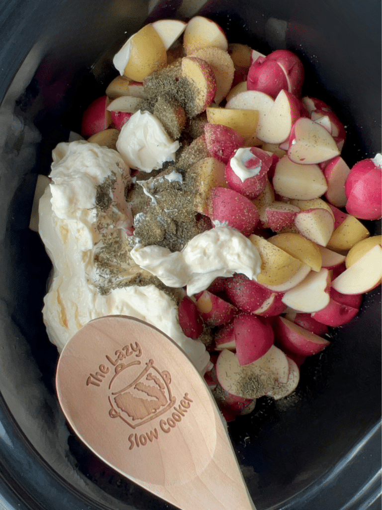 all ingredients other than fresh herbs in crockpot not stirred together yet