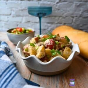 a bowl full of slow cooker warm potato salad