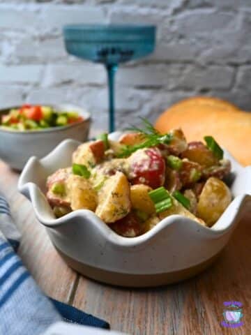 a bowl full of slow cooker warm potato salad