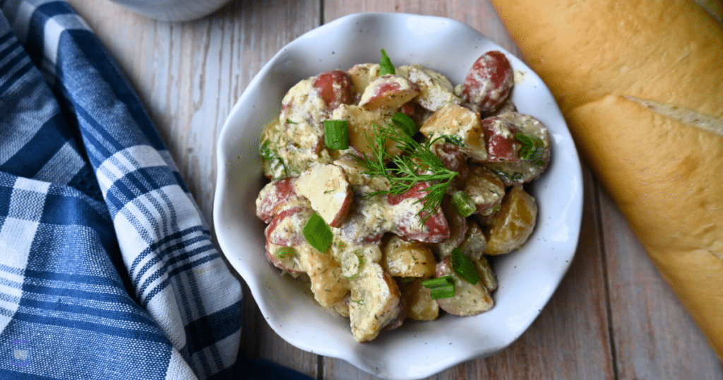 a bowl full of slow cooker warm potato salad