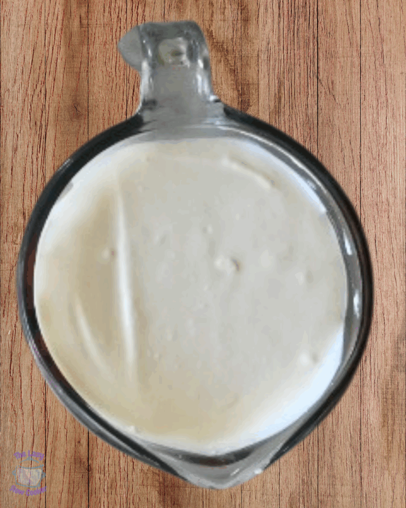 Whipped cottage cheese in a measuring cup