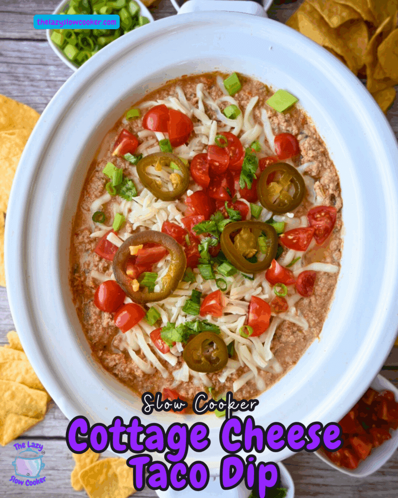 A crockpot full of cottage cheese taco dip with toppings