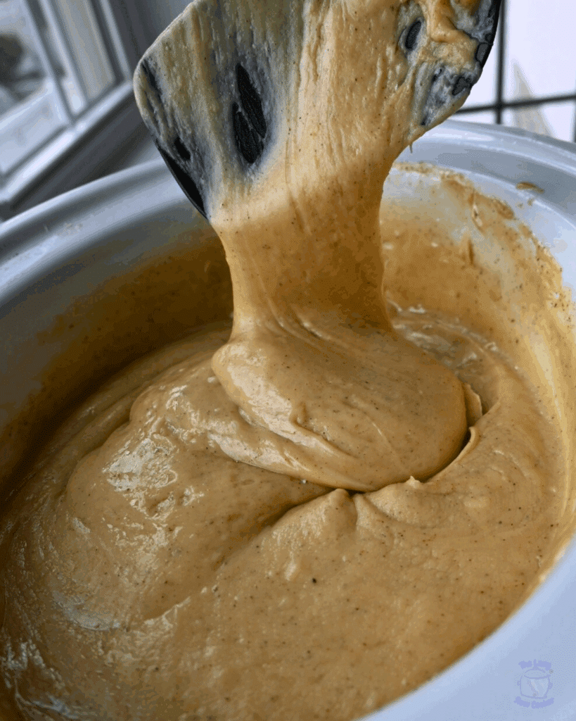 slow cooker fudge ingredients heated and mixed